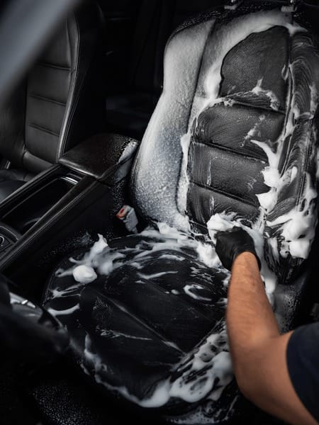 Premium car leather seat foam cleaning