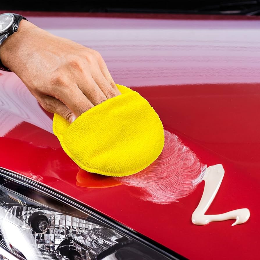 Wax polish on red car paint